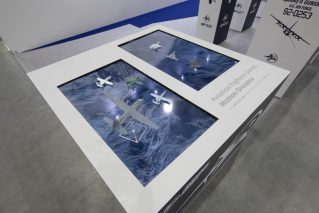 展示会ブースデザインと装飾の実例-全日本模型ホビーショーAVIATION FIGHTERS Booth モーションジオラマの様子 (5)